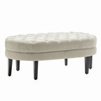Pouf de cocktail ovale en tissu Itan avec pieds en bois d'hévéa