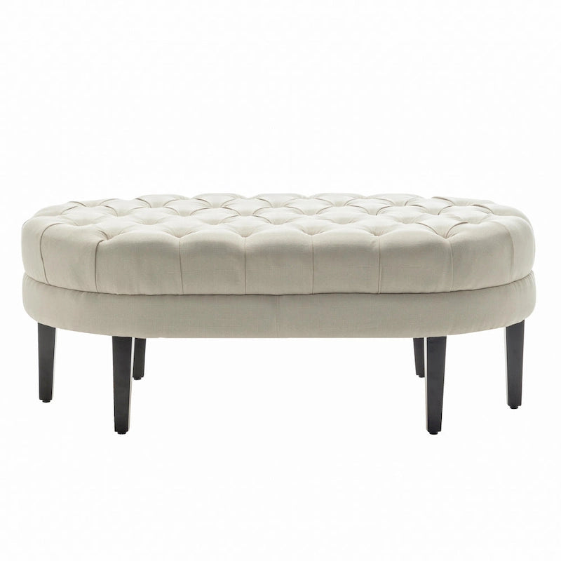 Pouf de cocktail ovale en tissu Itan avec pieds en bois d'hévéa