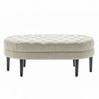 Pouf de cocktail ovale en tissu Itan avec pieds en bois d'hévéa