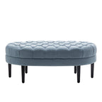 Pouf de cocktail ovale en tissu Itan avec pieds en bois d'hévéa