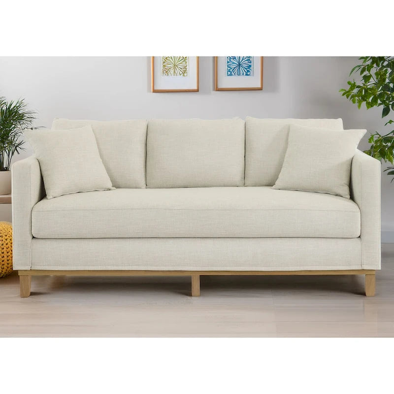 Canapé 3 places rembourré Jolene avec piètement en bois et coussins décoratifs